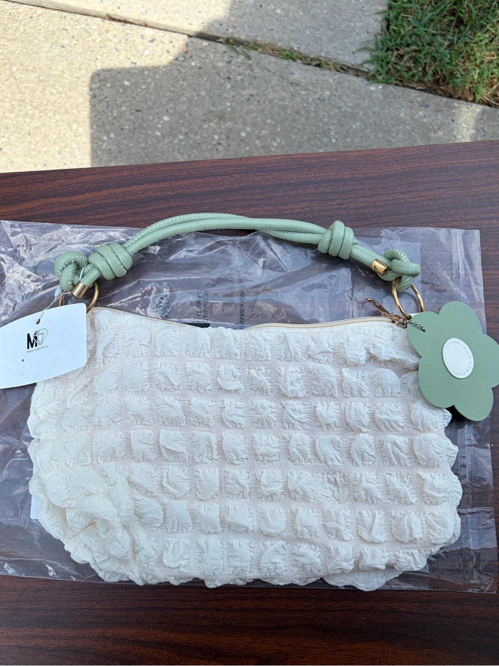 MKS America Cream Textured Mini Hobo Bag Flower Charm Knotted Handle NW